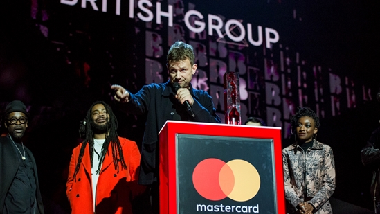 Gorillaz accepting their award for British Group  at The BRITs