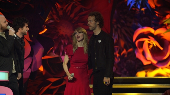 Coldplay accepting the Mastercard Album of the Year from Madonna at The BRITs 2006