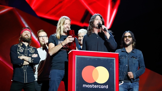 Foo Fighters accepting their award for International Group at The BRITs
