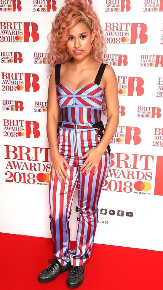 Raye on The BRITs 2018 Nominations Show Red Carpet.