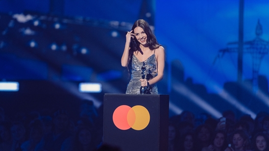 Olivia Rodrigo receiving the award for International Song of the Year