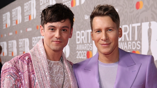 Tom Daley and Dustin Lance Black on the 2023 BRIT Awards red carpet