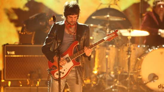 Serge Pizzorno performing 'Fire' at The BRITs 2010